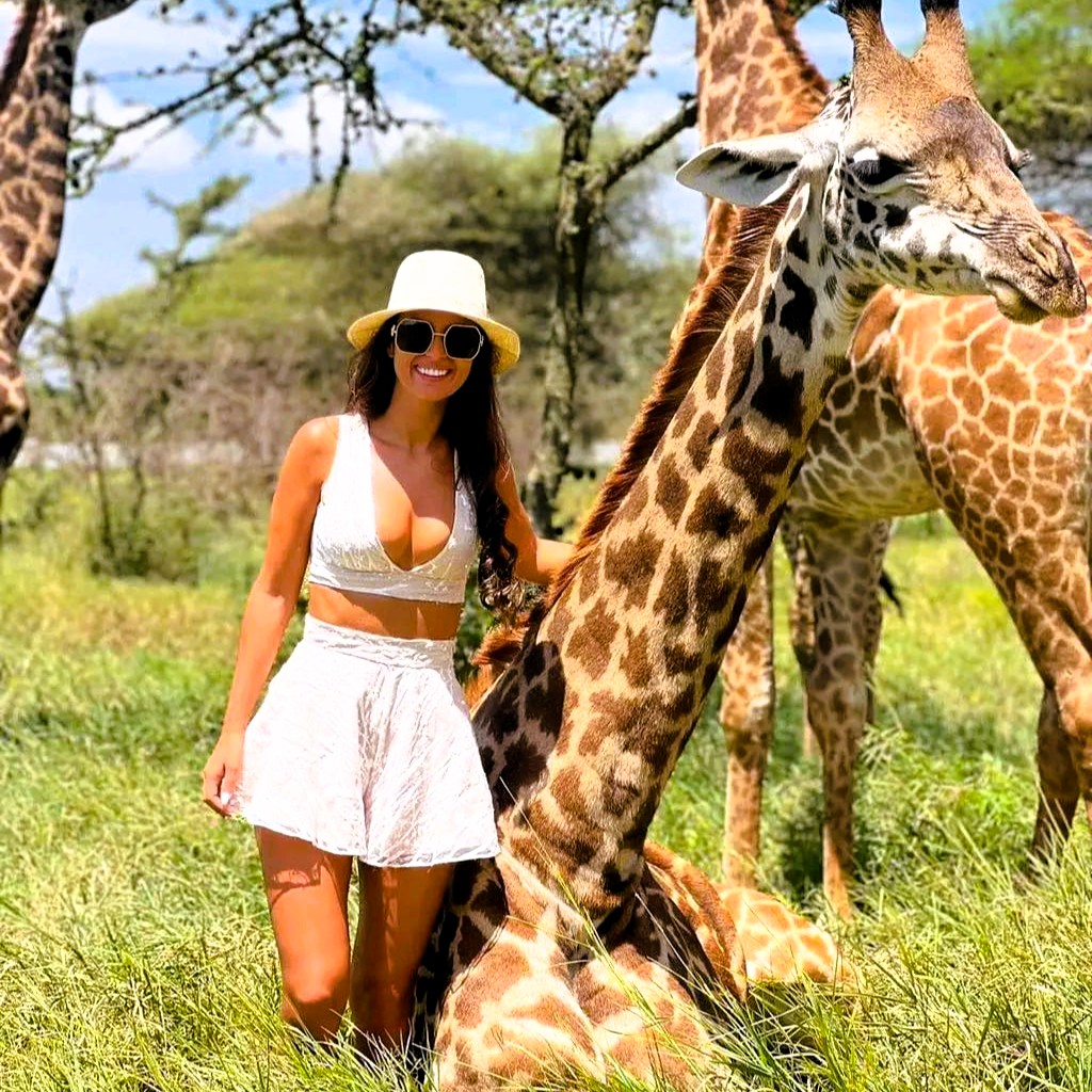 Safari vehicle driving through Tarangire National Park wildlife area